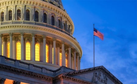 Close-up of the U.S. Capitol building rotunda in the evening